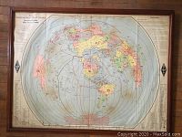 Full view of the framed vintage Amateur Radio Map of the World, showing map details and frame.