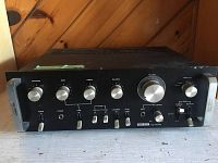 Full front view of Reflex Model ARA-665 amplifier showing multiple control knobs and switches, headphone jack, volume and function controls.