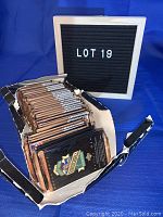 Box labeled Lot 19 containing 31 unopened copper foil packs of 1993 Upper Deck Major League Baseball Series One cards.