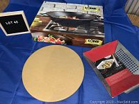 Full set including boxed Lodge Cast Iron Wok, uncovered wooden lazy Susan tray and uncased Epicure Outdoor Barbecue Wok