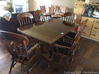 Full dining set showing table top and six chairs
