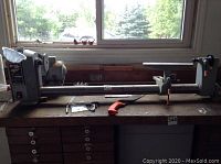 Full view of lathe on workbench showing overall condition