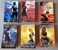 Front covers of six Kitty series paperback books by Carrie Vaughn showing cover art and titles