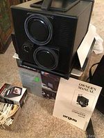 Sankyo Dualux 2000H dual lens Super 8 projector and the Argus Teleprint converter with the Argus owner's manual.