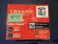 Box front showing Crock-Pot Little Dipper branding with product details in English and French.