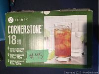 Image showing box of Libbey Cornerstone 18 piece glass set with product details and logo.