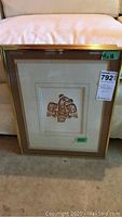 Single framed Haida Eagle print with gold frame and double matte, signed by Bill Reid.