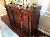 Front view showing entire server with three drawers and two cabinets