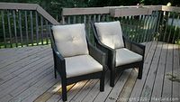 Front view of both chairs on wooden deck
