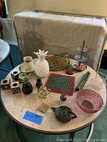 Wide view of table with all decorative items shown clearly to identify each piece.