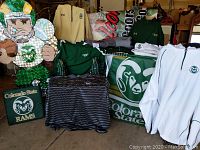 Full lot layout including apparel, banners, stadium seat, and light-up yard sign.