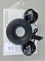 Top view of Dell 2.1 Speaker System showing subwoofer and two satellite speakers on top of original box.