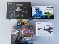 Overview of all four boxed items arranged on table