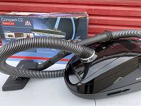 Front angle showing canister unit, hose attached and original box in background