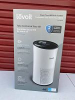 Front of retail box showing Levoit branding, model LV-H133, 3-stage True HEPA filtration and 2-year warranty