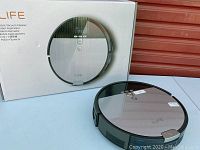 ILIFE A4S robot vacuum and original box