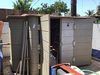 Front and side view of assembled shed showing double doors and side panel