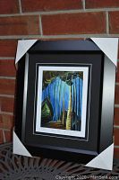 Overall view of framed and matted print with protective corner guards