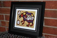 Full view of framed "Sacred Bear" print showing black frame and matting, bear artwork good condition