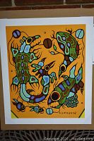 Full view of the 24 by 20 inch fine art print "Animal Spirits" with bright orange background and abstract animal designs. Signed by Norval Morrisseau.