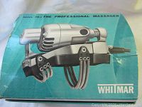 Original turquoise box with image and branding of the Whitmar Professional Massager Model PM-1.