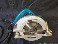 Top view of Makita circular saw showing the blade and part of the handle and base plate