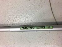 Close-up of rod kicker showing Racing Equipment label and Selden Mast Sweden mark