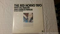 Front cover of The Red Norvo Trio vinyl record album with featured musicians and title.