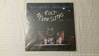 Front cover of Neil Young & Crazy Horse Rust Never Sleeps vinyl with stage night scene showing band performing.