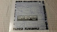 Front cover of Duke Ellington 'Fargo Encores' vintage vinyl LP record sealed in plastic sleeve, showing artwork and text.