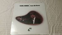 Front cover of the sealed Earl Hines Tour de Force vinyl LP showing artist and album title.