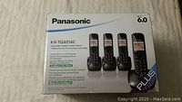 Closed box showing Panasonic KX-TGA014C expandable digital cordless phone set with four cordless handsets, DECT 6.0.