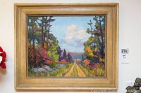 Full frontal view of framed landscape painting