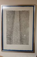 Full view of the framed lithograph showing intricate geometric design and framing.