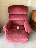 Front view of mauve microfiber recliner chair showing padded cushioned backrest, seat, and armrests.