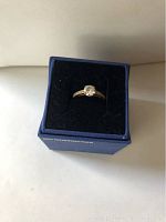 Ring in blue Swarovski box, showing entire ring design and packaging