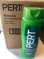 Box showing the Pert Plus branding and product details including 6 pcs of 500ml bottles.