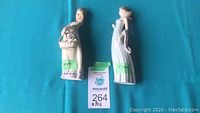 Photo showing both Lladro figurines side by side with size noted as approximately 7-8 inches high.