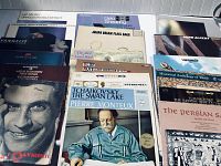 Top view of assortment of vinyl record albums featuring classical, jazz, and world music titles