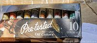 Close-up of Grumbacher oil colors set showing 10 tubes of pre-tested oil paint