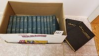 Box containing 13 volumes of The Works of R. Lewis Stevenson along with two additional hardback books titled 'Lincoln' and 'Greek Legends'