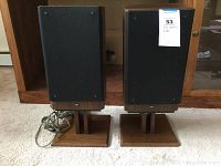 Front view of both ADS L7e speakers on stands with grills installed