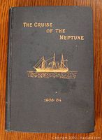 Front cover of hardcover book showing title and ship illustration in gold on black cover.