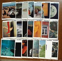 Overview of all 22 Hasselblad camera magazine issues laid out in three rows showing various cover images including a boat on a beach, moon, underwater diver, and portraits.