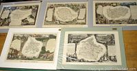 Five matted hand-tinted maps of French departments laid out in plastic backing