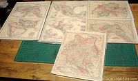 Overview photo showing all five maps laid out on table