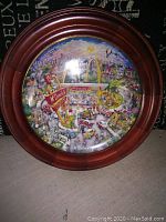Full view of the framed collector plate showing the McDonald's themed artwork with bright colors and a sunny scene.