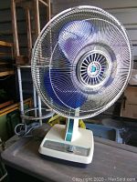 Front and side view of the full fan showing size, structure, and condition.