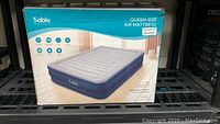 Box showing Sable queen size air mattress model SAHF046 with specifications, features and image of mattress.