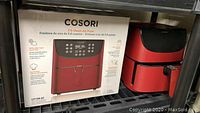 Box and front view picture of the Cosori Air Fryer highlighting model CP158-AF, 5.8 quart capacity, and control panel features